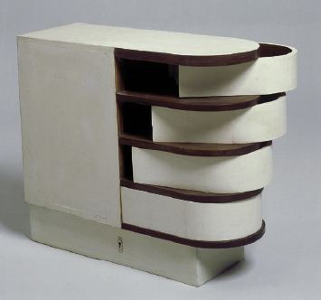 Cabinet à tiroirs pivotants par Eileen Gray